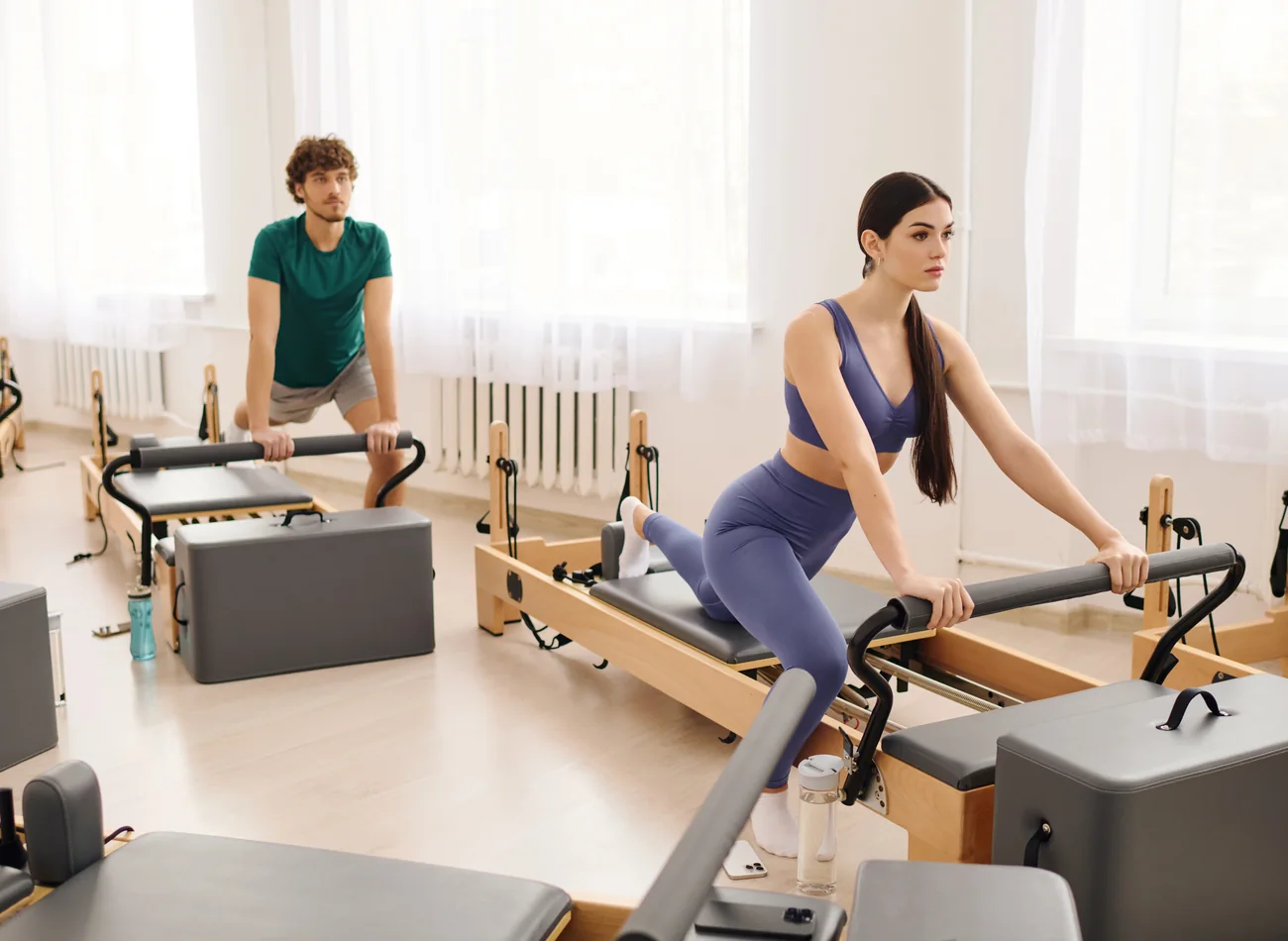 Reformer Pilates in a bright studio